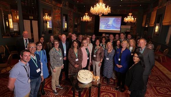 Image of alumni of the Top Management Programme and Advance HE staff celebrating the 50th cohort event