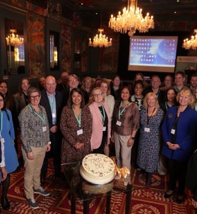 Image of alumni of the Top Management Programme and Advance HE staff celebrating the 50th cohort event