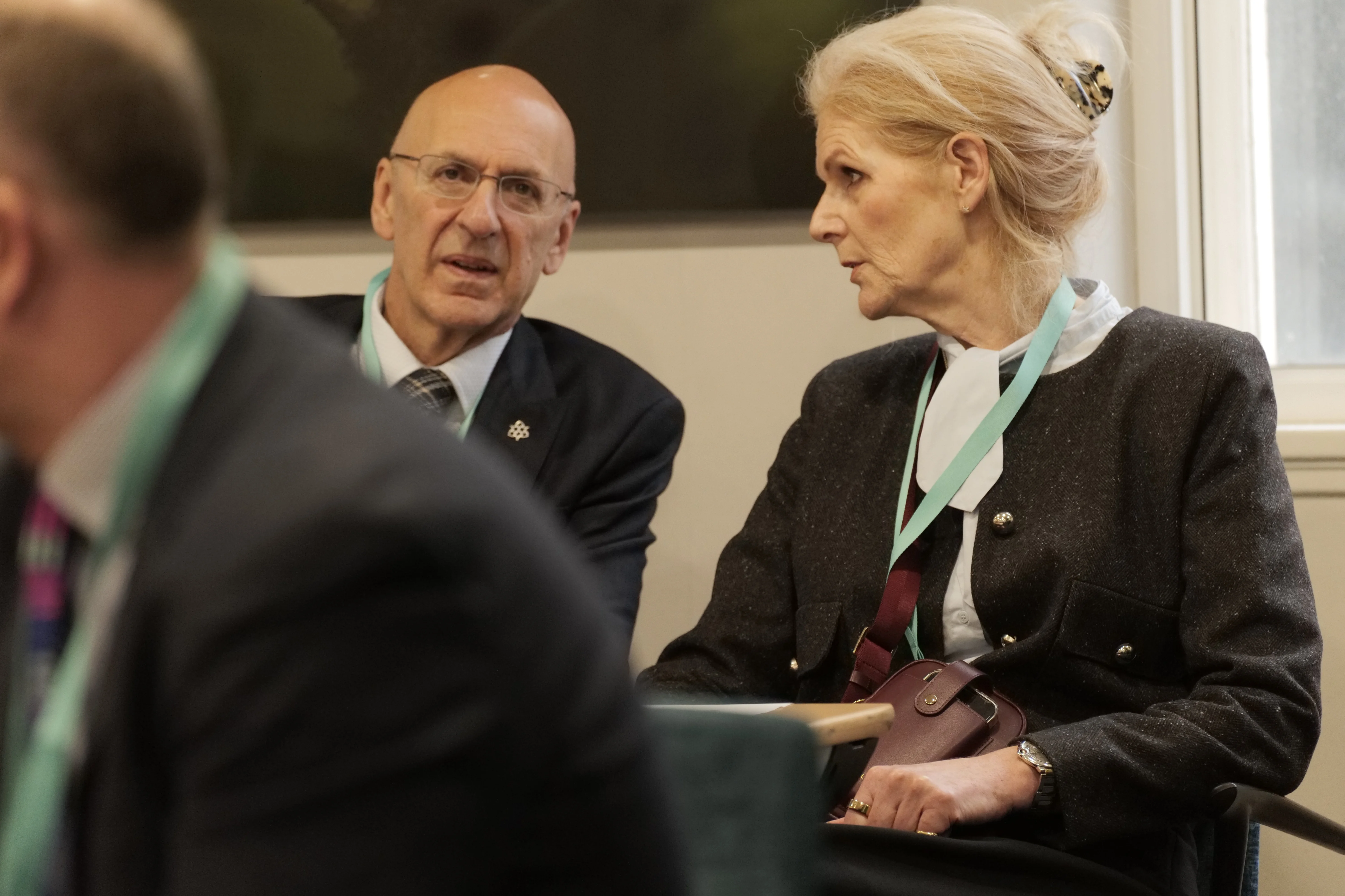 Two people speaking at the Governance Conference