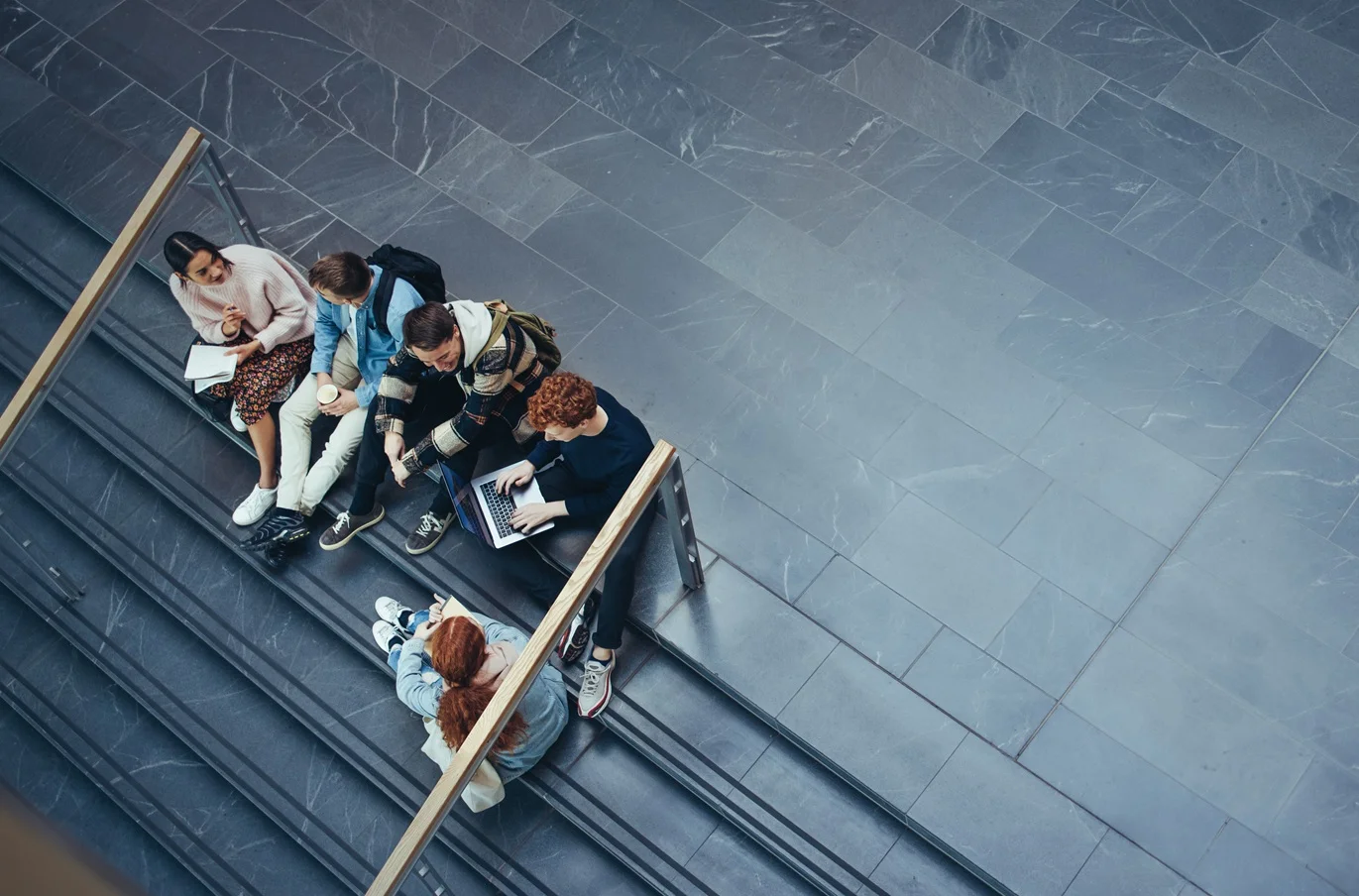 Young people studying in college campus